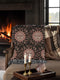 Luxurious woven cotton throw featuring dreamy blush pink sun faces with closed eyes against black background with delicate ray patterns and elegant fringe trim. Perfect celestial wall hanging, witchy bedroom decor, or dark academia throw blanket.